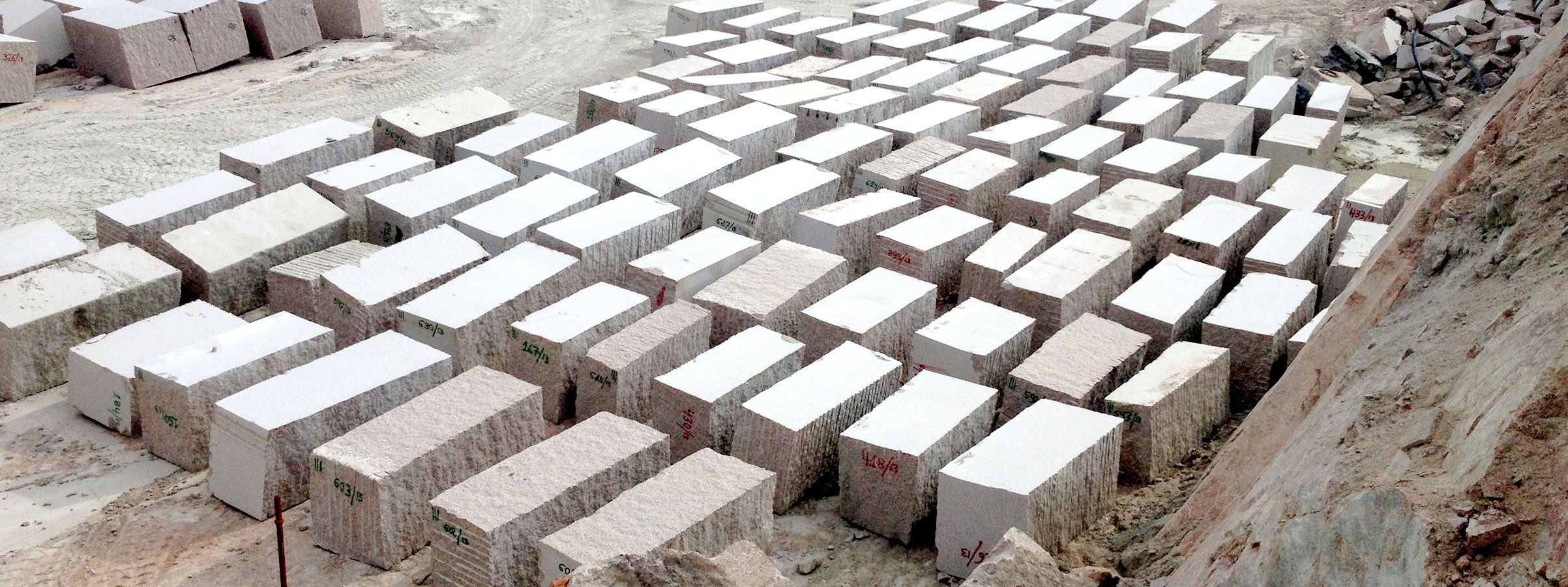 Blocks of Rosa Porriño stored in the quarry