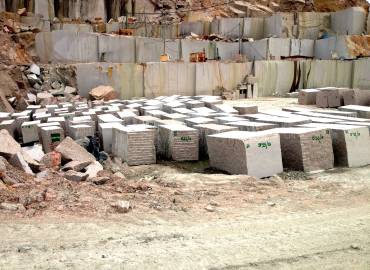 Blocks of Rosa Porriño stored in the quarry